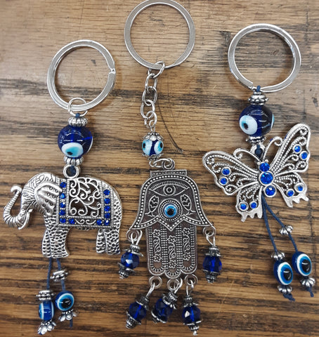Free Shipping. Evil Eye Key Chains, 3 choices; Elephant, Hamsa hand, Butterfly