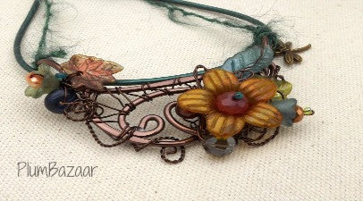 Wire and leather necklace with hand painted flowers