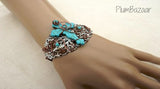 Rustic filigree bracelet with turquoise blue stone cross