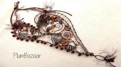 Handmade wire wall hanging, whimsical beaded heart in brown tones