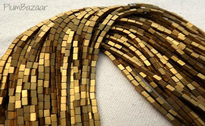 Gold metallic hematite rectangle beads, two 10" strands